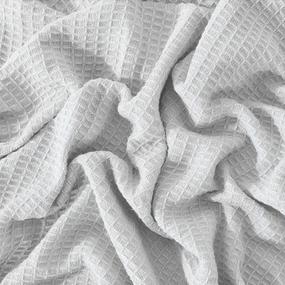 Thermal Blanket Waffle Knit in Pure White made from soft 325 GSM fabric with a breathable textured waffle knit design